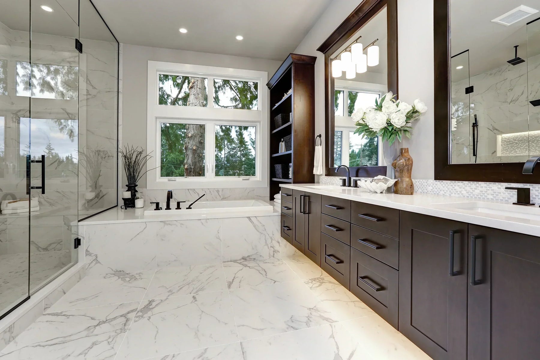Stylish new bathroom with heated marble floor for luxurious radiant heat