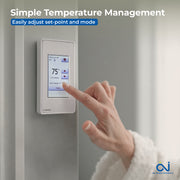06-homeowner-adjusting-touchscreen-thermostat-udg4