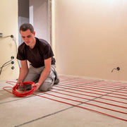 LuxHeat_cable_installation_man_lacing_cable